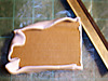 Step 2 - Wrap cardboard and trim excess clay