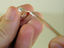 Sliding pen clip onto cap