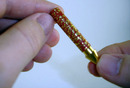 Pressing pen tip into barrel