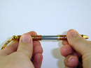 Pushing pen halves together