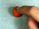 Push in the pumpkin stem