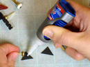 Gluing brad onto eye